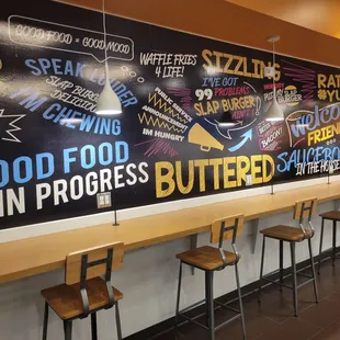 a long table with chairs in front of it