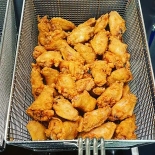 a basket full of fried chicken