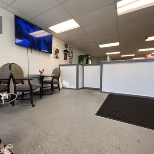 POS and indoor seating (3 tables with 2 chairs to each table)