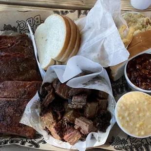 1/2 rack of ribs, 1lb burnt ends, cheesy corn, beans, fries, potato salad