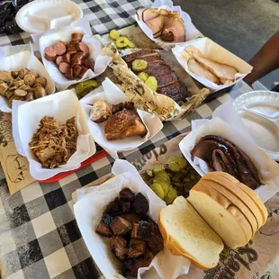 Sausages (both), turkey, ribs, chicken, pulled port, brisket, burnt end