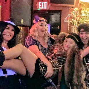 Roaring twenties party at bar with friends.