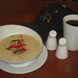 a bowl of soup and a cup of coffee