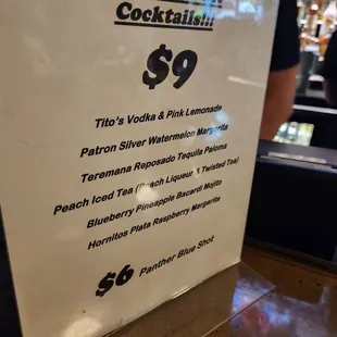a sign for a cocktail