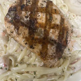 Hand made Seafood Alfredo with Grilled Salmon