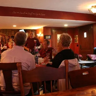 a group of people sitting at a table