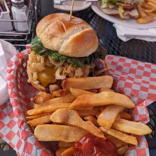 My Roadhouse Burger. 1/2 lb with Tomato, lettuce, pickle, onion straws, aoli may, and bbq sauce.