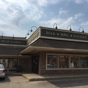 a car parked in front of a restaurant