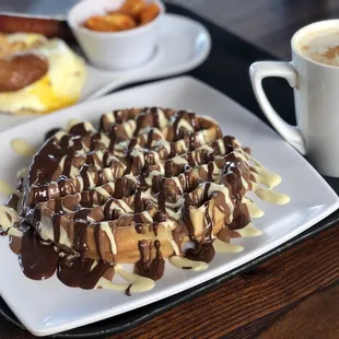 Triple Chocolate Waffle, white chocolate mocha, and breakfast sandwich