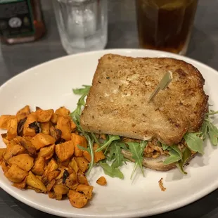 Pulled Chicken Sandwhich sweet potatoes