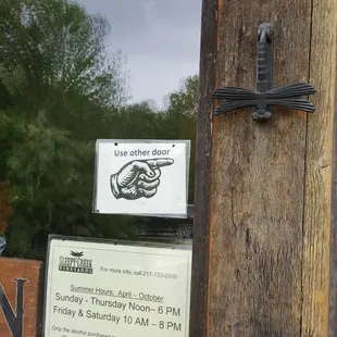 Their door knocker and spring and summer hours.