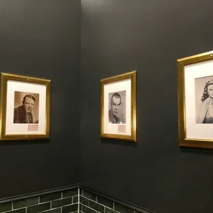 three framed portraits of men