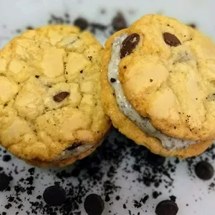 two chocolate chip cookies on a plate