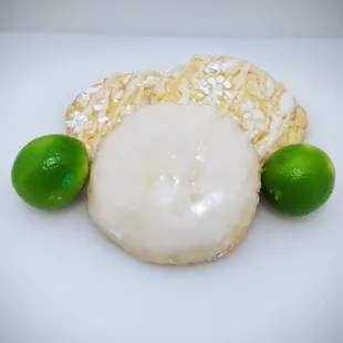 a doughnut and limes