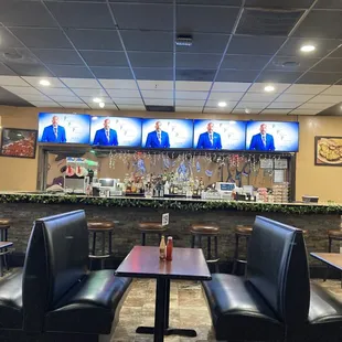 Dining room with bar in background