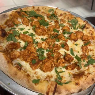 Small Butter Chicken pizza slice