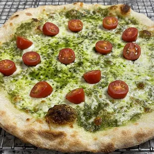 Basil Pesto pizza, basil pesto and grape tomatoes