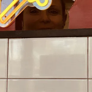 Katie peeking  to see if I liked my pizza lol.