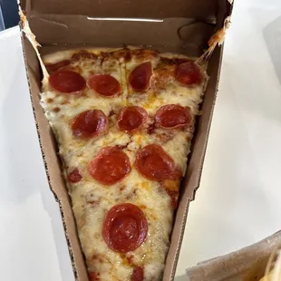 Giant pepperoni pizza, thin crunch and delicious.