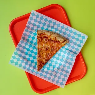 a slice of pizza on a tray