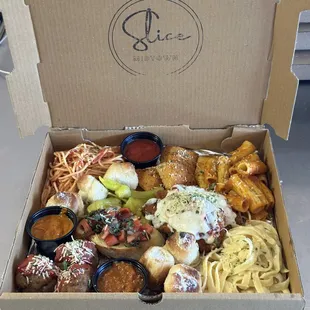 a variety of food items in a box