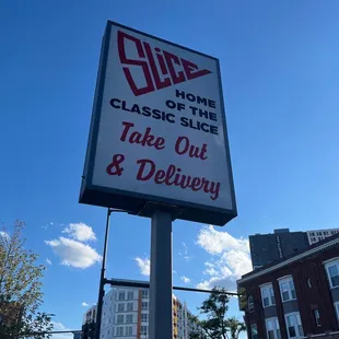 a sign for a take out and delivery place