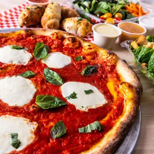 MARGHERITA: 
Fresh Pizza Sauce, Fresh Mozzarella, Basil