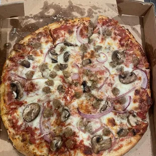 Medium sausage, mushroom and onion pizza
