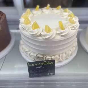 a cake with lemons on top