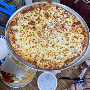 Half pepperoni half cheese XL pie