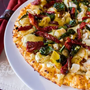 Greek Slice - Sun Dried Tom. Garlic Cream Sauce, Feta Cheese, Sauteed Spinach, Sun Dried Tomatoes, Artichokes &amp; Rosemary Chicken