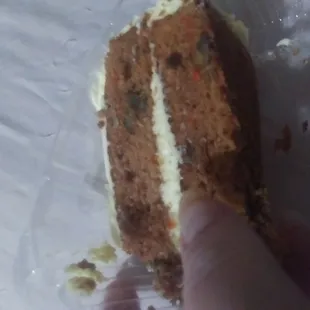 A very small piece of carrot cake. Objects are smaller than they appear. Especially for $5.99