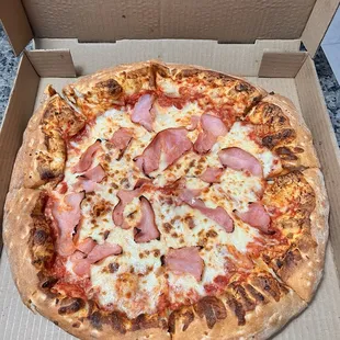 Large ham pizza. Large one topping for $9.99