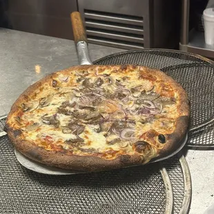 Pizza just coming out of the oven
