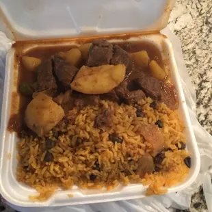 a meal in a styrofoam container