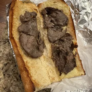 Very sad cheesesteak. Roll was grilled. Steak not cut up at all. Steak very tough. Hardened cheese on roll.