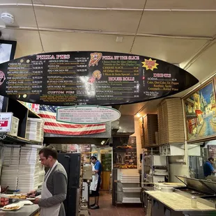 Order off the surfboard or they have paper menus to go A slice of pizza