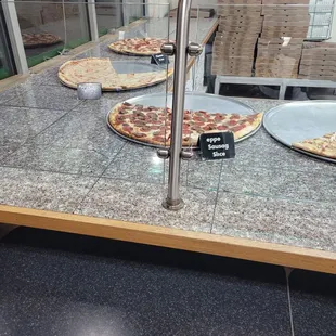 pizzas on a counter