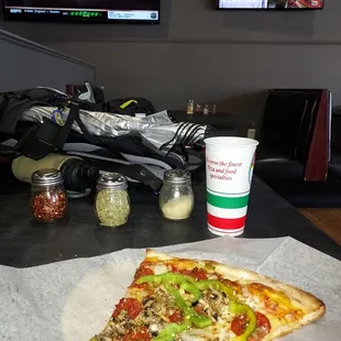 Pizza slice, soda, Sports on TVs