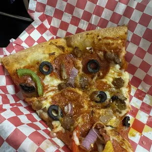 Slice of combination pizza