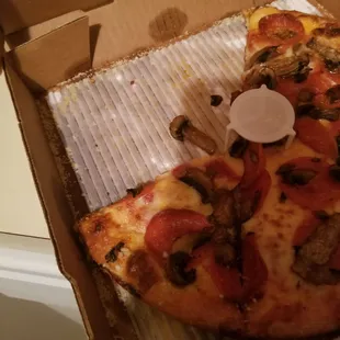 I removed slices to show the grease from it sitting in the cold somewhere