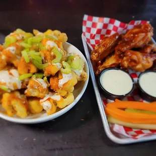 Cauliflower and chicken wings - this is a really big bowl of cauliflower,  way larger than looks in the photo and SO GOOOOOOD