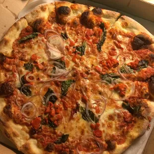 Large pizza with onion, roasted red peppers and fresh basil - delicious!