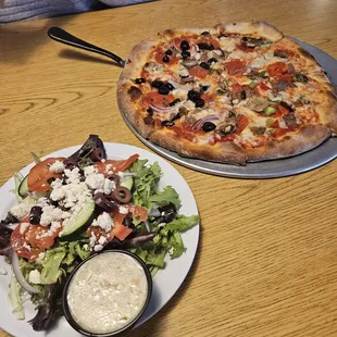 Greek salad and Kitchen sink pizza