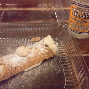 Cannoli and blurry (non-alcoholic) vanilla cream soda