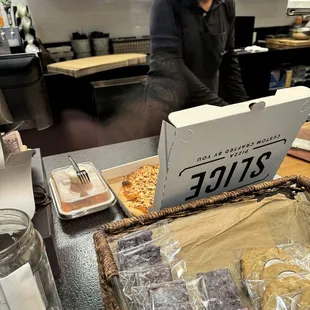 a man preparing a pizza