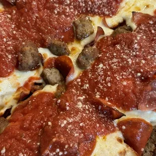 pepperoni, sausage, and cheese