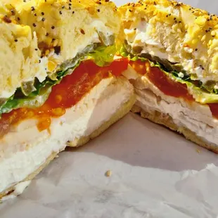 Bagel with turkey, cream cheese, jalapenos, lettuce,....
