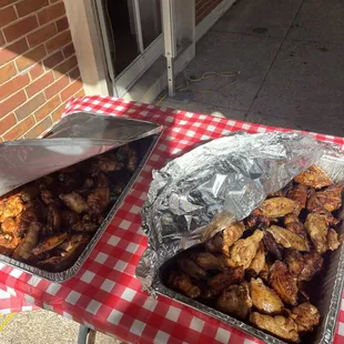 Two trays of Finger Licking Wangs