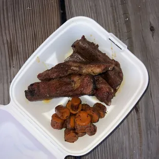 An order of Ribs and Carrot Burnt Ends side